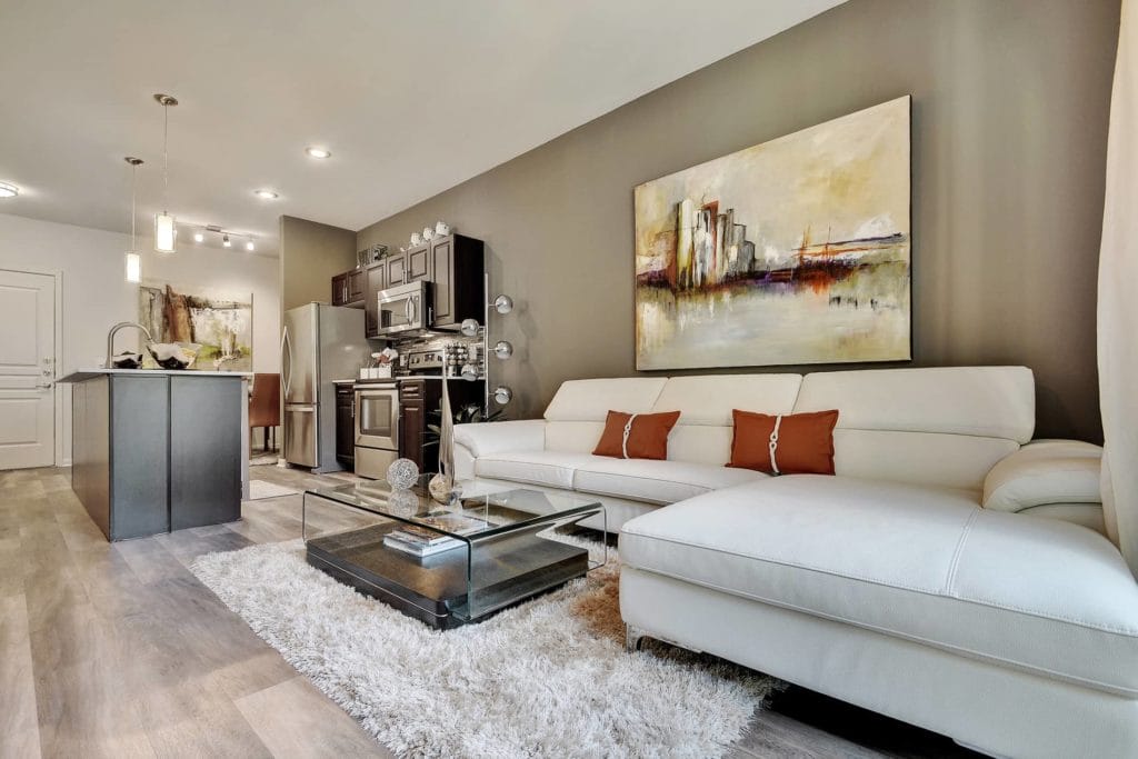 A well lit room at the Residence apartments at the Domain