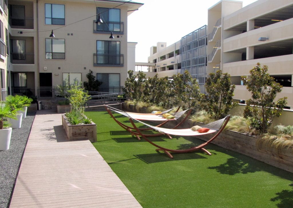 Relaxing outdoor hammocks at the Villages apartment at the Domain.